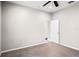 Neutral bedroom with carpet, ceiling fan, and a view into an adjacent room at 1712 Boat Launch Rd, Kissimmee, FL 34746
