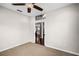 Empty bedroom with view of the kitchen through the doorway at 1712 Boat Launch Rd, Kissimmee, FL 34746