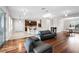 Bright living room with hardwood floors and an open floor plan connected to the kitchen at 1712 Boat Launch Rd, Kissimmee, FL 34746