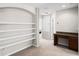Loft space featuring built-in shelves and a desk, ideal for a home office or study area at 1712 Boat Launch Rd, Kissimmee, FL 34746