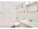 Full bathroom featuring a shower-tub combo, neutral walls, large mirror, and white vanity at 190 Hickory Woods Ct # 12B, Deltona, FL 32725