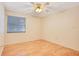 Cozy bedroom with wood floors, neutral paint and ceiling fan at 190 Hickory Woods Ct # 12B, Deltona, FL 32725