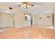 Bright living room featuring wood floors, neutral paint and generous closet space at 190 Hickory Woods Ct # 12B, Deltona, FL 32725