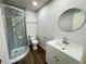 Updated bathroom with modern shower, vanity, and stylish fixtures, offering a clean and contemporary design at 1921 Nw 12Th St, Ocala, FL 34475