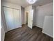 Inviting bedroom featuring stylish flooring, ample closet space, and neutral tones, creating a cozy and functional retreat at 1921 Nw 12Th St, Ocala, FL 34475