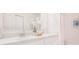 Bright bathroom featuring double sinks with modern fixtures and white cabinetry at 2144 Hibiscus Pl, Kissimmee, FL 34759