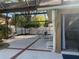 Screened-in back patio with outdoor seating and a fountain offers relaxation and an ideal outdoor living space at 2155 Palm View Dr, Apopka, FL 32712