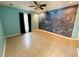 Bright bedroom featuring tile flooring and a unique underwater mural accent wall at 2155 Palm View Dr, Apopka, FL 32712
