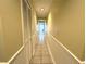 Hallway with tile flooring and closet at 2155 Palm View Dr, Apopka, FL 32712