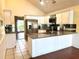 Kitchen with stainless steel appliances, granite countertops, and white cabinetry at 2155 Palm View Dr, Apopka, FL 32712