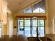 Bright kitchen view through to backyard pool area at 2155 Palm View Dr, Apopka, FL 32712