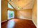 Bright living room with hardwood floors and large windows at 2155 Palm View Dr, Apopka, FL 32712