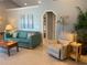 Comfortable living room with tile floors, vaulted ceiling, and an inviting atmosphere at 2155 Palm View Dr, Apopka, FL 32712