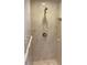Shower stall featuring refined tile work, chrome fixtures, and storage niche at 2155 Palm View Dr, Apopka, FL 32712