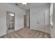 Bedroom showcasing a closet and an ensuite bathroom, providing convenience and privacy at 2311 Victoria Dr, Davenport, FL 33837