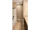 Bathroom featuring a shower-tub combo with a sink and vanity at 254 Alford Dr, Davenport, FL 33896