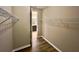 Spacious walk-in closet with shelving and rod for organized storage at 254 Alford Dr, Davenport, FL 33896