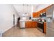 Bright kitchen with stainless steel appliances, granite countertops, and an open layout at 2602 Adelia Blvd, Deltona, FL 32725
