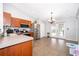 Bright kitchen featuring stainless steel appliances, breakfast bar and tile flooring leading to french doors at 2602 Adelia Blvd, Deltona, FL 32725