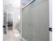 View of the bathroom and shower and also a view into the connected bedroom space at 2602 Shirehall Ln, Winter Garden, FL 34787