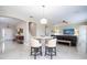 Spacious living space with a dining area and comfortable seating at 2602 Shirehall Ln, Winter Garden, FL 34787