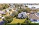 Beautifully kept home featuring a spacious yard with trimmed trees and a manicured lawn at 2602 Shirehall Ln, Winter Garden, FL 34787