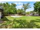 Expansive backyard with a sparkling pool, providing plenty of space for recreation and relaxation at 261 West Citrus St, Altamonte Springs, FL 32714