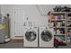 Functional laundry area with side-by-side washer and dryer at 261 West Citrus St, Altamonte Springs, FL 32714