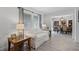 Bright living room with a white sofa and decorative tables is well-lit by large windows at 261 West Citrus St, Altamonte Springs, FL 32714
