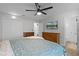 Spacious bedroom featuring ceiling fan, closet, ensuite bathroom and television at 261 West Citrus St, Altamonte Springs, FL 32714