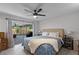 Light-filled main bedroom with ceiling fan, patio access and neutral decor at 261 West Citrus St, Altamonte Springs, FL 32714