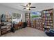 Comfortable office featuring built-in bookshelves, desk, and view of outdoors at 261 West Citrus St, Altamonte Springs, FL 32714