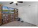Office space with shelves, storage, closet, television, and floor-cleaning robot at 261 West Citrus St, Altamonte Springs, FL 32714