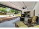 Outdoor covered patio with furniture overlooking pool and backyard at 261 West Citrus St, Altamonte Springs, FL 32714