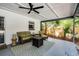 Inviting covered patio with comfortable seating and ceiling fan at 261 West Citrus St, Altamonte Springs, FL 32714