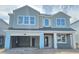 Charming two-story home with a two-car garage and a modern design at 2672 Great Heron Ave, St Cloud, FL 34773