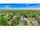 Aerial view showcases the property's location within a verdant residential neighborhood at 275 W 3Rd St, Chuluota, FL 32766