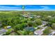 Aerial view shows the property's proximity to local amenities at 275 W 3Rd St, Chuluota, FL 32766