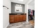 Modern bathroom featuring a stylish vanity, mirror, and plenty of storage at 275 W 3Rd St, Chuluota, FL 32766