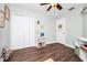 Light and airy bedroom with hardwood floors and neutral tones at 275 W 3Rd St, Chuluota, FL 32766