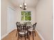 Cozy dining area with natural light, perfect for enjoying meals with a view at 275 W 3Rd St, Chuluota, FL 32766