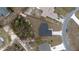 Birds-eye view of a charming single-Gathering home featuring a lush wooded area at 2824 Sw 166Th Ln, Ocala, FL 34473
