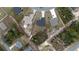 A peaceful neighborhood with well-spaced houses and lush greenery viewed from above at 2824 Sw 166Th Ln, Ocala, FL 34473
