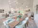 Open concept living area featuring dining room with bright natural light and modern accents at 2824 Sw 166Th Ln, Ocala, FL 34473