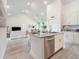 Modern kitchen featuring granite countertops, stainless steel appliances, and an island with seating at 2824 Sw 166Th Ln, Ocala, FL 34473