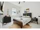 Charming bedroom with tile floors, natural light, and a ceiling fan at 2905 Tupelo Loop, St Cloud, FL 34772