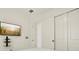 Bright and modern bedroom featuring sleek built-ins, a TV, and tile floors at 2905 Tupelo Loop, St Cloud, FL 34772
