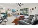 Cozy living room showcasing an entertainment center, comfortable seating, and an open layout at 2905 Tupelo Loop, St Cloud, FL 34772