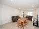 Open living room featuring tile flooring, neutral paint, comfortable seating, and a dining area at 2936 Sunridge Loop, St Cloud, FL 34771