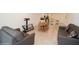 Open living room featuring tile flooring, neutral paint, comfortable seating, and a dining area at 2936 Sunridge Loop, St Cloud, FL 34771